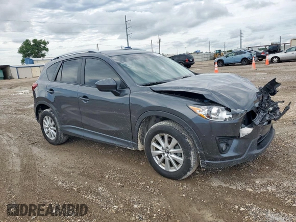 2014 Mazda CX-5 Touring z VIN JM3KE2CY7E0308580, wystawiony jako Copart lot #60565835 z przebiegiem 92 708 mil mil oraz Szkoda całkowita • Salvage title. Historia ofert i sprzedaży dostępna na DreamBid. Obrazek 4.