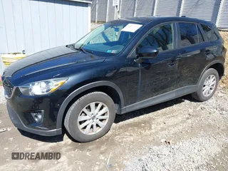 2014 Mazda CX-5 Touring with VIN JM3KE4CY8E0333029, listed as a IAAI auction lot 41857199 with 218,887 mi miles. Bid and sale history available at carsss.com. Image 22.