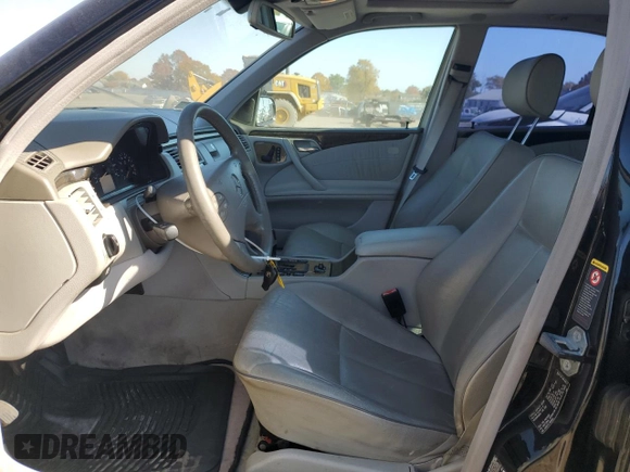 2002 Mercedes-Benz E-Class with VIN WDBJF70J82B492531, listed as a Copart auction lot 77485094 with 85,750 mi miles and Salvage Title. Bid and sale history available at carsss.com. Image 7.