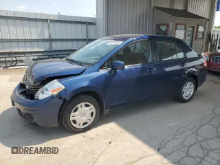 2011 Nissan Versa S with VIN 3N1BC1AP7BL402043, listed as a Copart auction lot 60228645 with 86,179 mi miles and Salvage title. Bid and sale history available at DreamBid. Image 1.