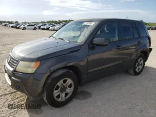 2011 Suzuki Grand Vitara Premium with VIN JS3TE0D24B4100755, listed as a Copart auction lot 61397695 with 180,288 mi miles and Salvage title. Bid and sale history available at DreamBid. Image 1.