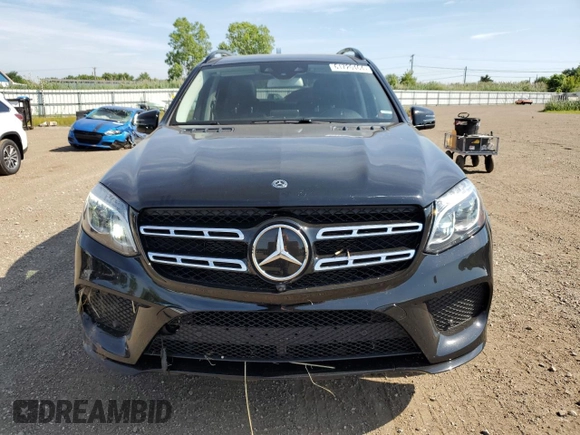 2019 Mercedes-Benz GLS 550 with VIN 4JGDF7DE7KB207583, listed as a Copart auction lot 61720464 with 76,040 mi miles and Salvage Title. Bid and sale history available at DreamBid. Image 5.