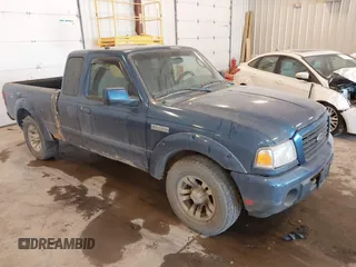 2009 Ford Ranger XLT z VIN 1FTZR45E79PA31095, wystawiony jako IAAI lot #42408282 z przebiegiem 113 404 mil mil oraz . Historia ofert i sprzedaży dostępna na DreamBid. Obrazek 1.