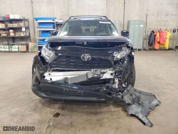 2019 Toyota RAV4 XLE with VIN JTMP1RFV9KD507333, listed as a Copart auction lot 51973775 with 94,831 mi miles and Salvage Title. Bid and sale history available at carsss.com. Image 5.