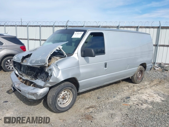 1998 Ford Econoline Cargo with VIN 1FTRE1428WHB30628, listed as a IAAI auction lot 41706164 with 153,223 mi miles. Bid and sale history available at carsss.com. Image 17.