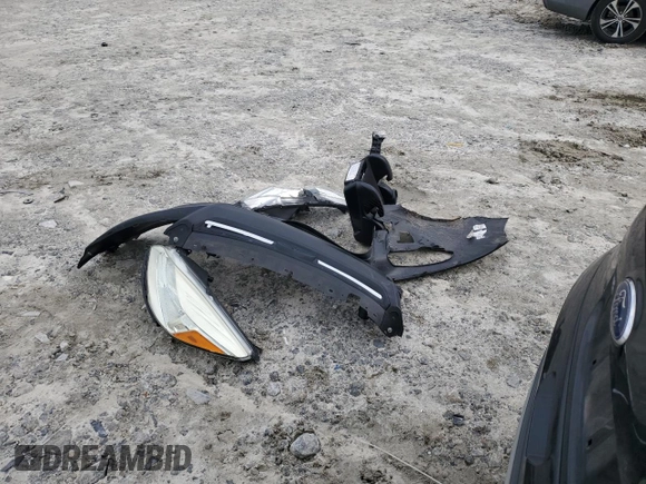 2016 Ford Escape SE z VIN 1FMCU0GX9GUB56962, wystawiony jako Copart lot #57071515 z przebiegiem 150 792 mil mil oraz Szkoda całkowita • Salvage title. Historia ofert i sprzedaży dostępna na DreamBid. Obrazek 13.