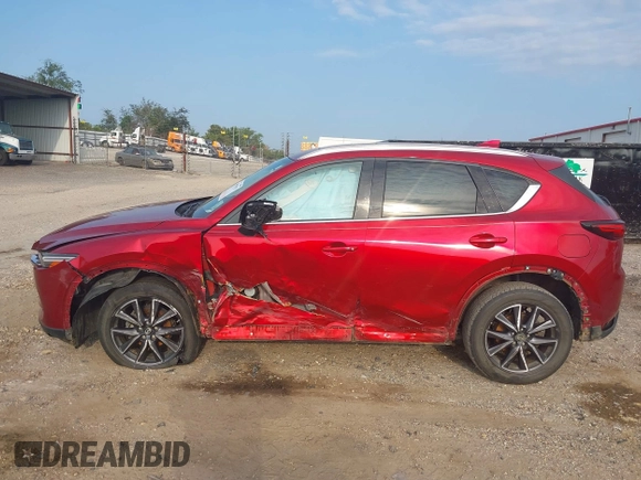 2017 Mazda CX-5 Grand Touring with VIN JM3KFADL8H0189033, listed as a IAAI auction lot 40029931 with 88,933 mi miles and . Bid and sale history available at carsss.com. Image 15.