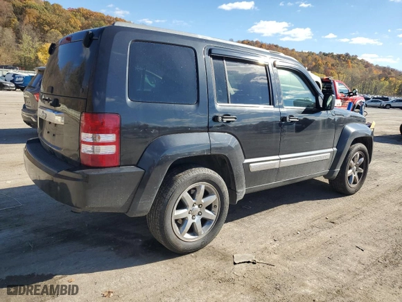 2009 Jeep Liberty Limited with VIN 1J8GN58K79W552651, listed as a Copart auction lot 77890874 with 140,342 mi miles and Salvage Title. Bid and sale history available at carsss.com. Image 3.