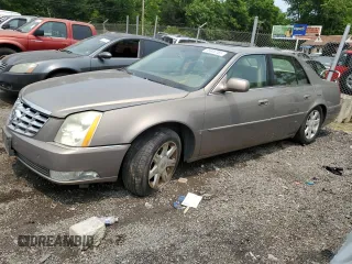 2006 Cadillac DTS 1SC z VIN 1G6KD57Y56U226092, wystawiony jako Copart lot #58946765 z przebiegiem 128 745 mil mil oraz Szkoda całkowita • Salvage title. Historia ofert i sprzedaży dostępna na DreamBid. Obrazek 1.
