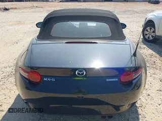 2021 Mazda MX-5 Miata Sport with VIN JM1NDAB73M0454064, listed as a IAAI auction lot 42613537 with 24,630 mi miles and . Bid and sale history available at DreamBid. Image 16.
