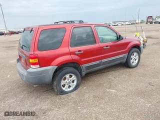 2007 Ford Escape XLT with VIN 1FMCU93167KB06439, listed as a IAAI auction lot 41906378 with 47,722 mi miles. Bid and sale history available at carsss.com. Image 4.