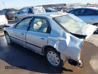 1997 Honda Accord LX with VIN 1HGCD5637VA249818, listed as a IAAI auction lot 40947015 with 170,153 mi miles and . Bid and sale history available at carsss.com. Image 3.