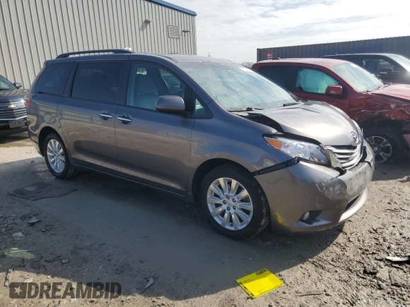 2015 Toyota Sienna Ltd with VIN 5TDDK3DC3FS127574, listed as a Copart auction lot 52703385 with 143,544 mi miles and Clean Title. Bid and sale history available at carsss.com. Image 4.