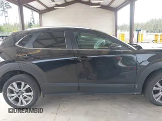 2023 Mazda CX-30 S Carbon Edition with VIN 3MVDMBCMXPM520776, listed as a IAAI auction lot 42205047 with Not provided miles and . Bid and sale history available at DreamBid. Image 14.