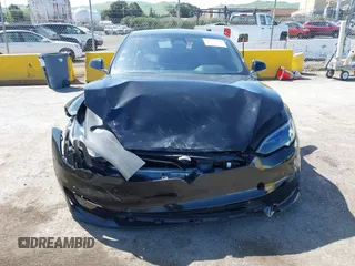 2022 Tesla Model S Plaid with VIN 5YJSA1E61NF483354, listed as a IAAI auction lot 41973636 with 32,541 mi miles and . Bid and sale history available at DreamBid. Image 12.