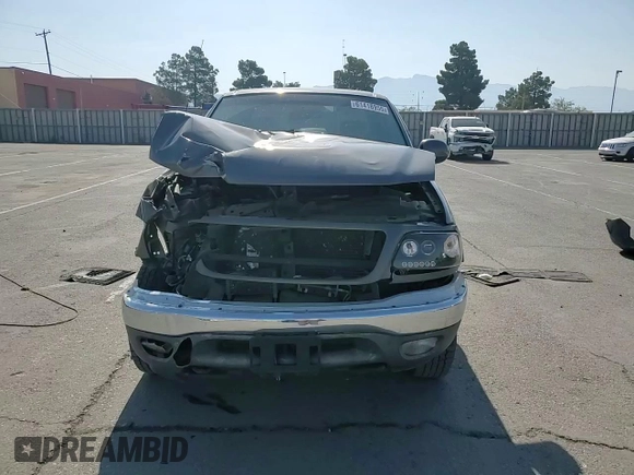 2002 Ford F-150 XL with VIN 1FTPX18L32NB65156, listed as a Copart auction lot 61418955 with 176,622 mi miles and Salvage title. Bid and sale history available at DreamBid. Image 13.