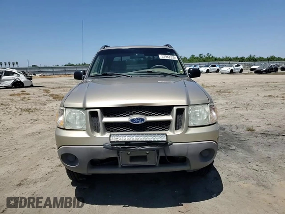 2001 Ford Explorer Sport Trac with VIN 1FMZU67E61UC71358, listed as a Copart auction lot 57982355 with 108,601 mi miles and Salvage title. Bid and sale history available at DreamBid. Image 13.