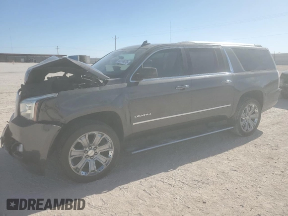 2015 GMC Yukon XL Denali with VIN 1GKS2JKJ3FR743050, listed as a Copart auction lot 50174675 with 143,154 mi miles and Salvage Title. Bid and sale history available at carsss.com. Image 1.