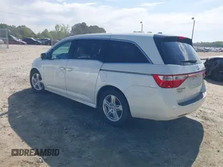 2013 Honda Odyssey Touring with VIN 5FNRL5H96DB009694, listed as a IAAI auction lot 42002487 with 182,867 mi miles and . Bid and sale history available at carsss.com. Image 3.