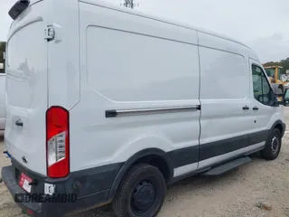 2019 Ford Transit with VIN 1FTYR2CM2KKA24925, listed as a IAAI auction lot 40769513 with 164,464 mi miles and . Bid and sale history available at DreamBid. Image 4.