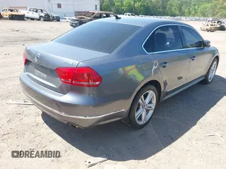 2013 Volkswagen Passat SEL Premium with VIN 1VWCM7A34DC055684, listed as a IAAI auction lot 42039636 with 167,746 mi miles. Bid and sale history available at carsss.com. Image 4.