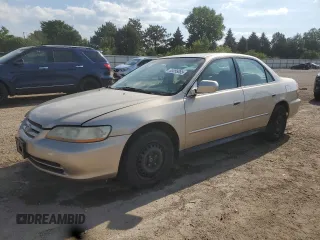 2002 Honda Accord LX with VIN 1HGCG66592A024567, listed as a Copart auction lot 63055085 with 132,978 mi miles and Salvage title. Bid and sale history available at DreamBid. Image 1.