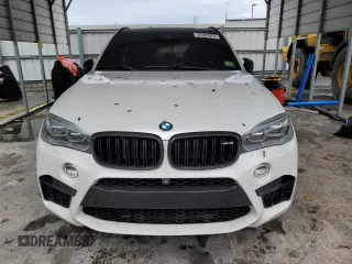 2015 BMW X5 M z VIN 5YMKT6C55F0C89468, wystawiony jako Copart lot #75391074 z przebiegiem Nie podano mil oraz Szkoda całkowita • Salvage title. Historia ofert i sprzedaży dostępna na DreamBid. Obrazek 5.