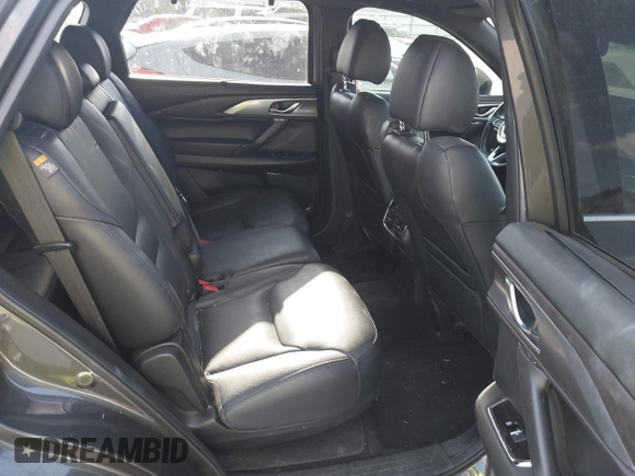 2016 Mazda CX-9 Grand Touring with VIN JM3TCADY8G0114940, listed as a IAAI auction lot 40701187 with 112,311 mi miles and . Bid and sale history available at DreamBid. Image 8.