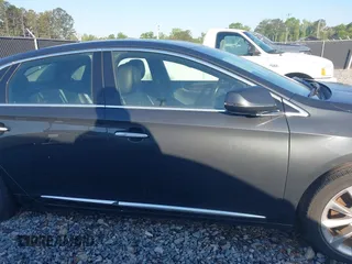 2013 Cadillac XTS Luxury with VIN 2G61P5S3XD9141306, listed as a IAAI auction lot 42034077 with 120,294 mi miles. Bid and sale history available at carsss.com. Image 13.