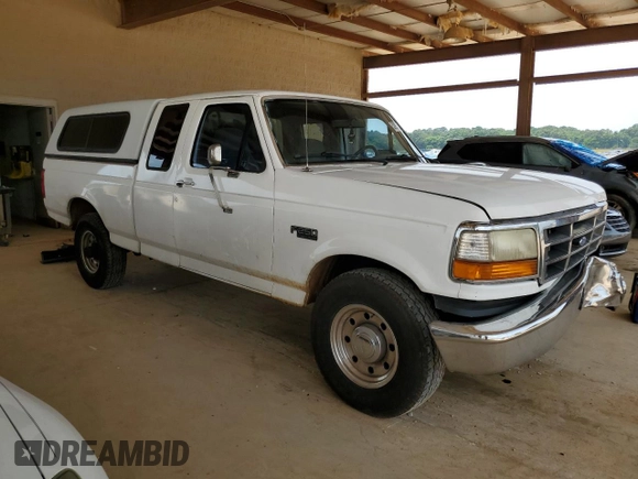 1997 Ford F-250 with VIN 1FTHX25F2VEC79419, listed as a Copart auction lot 53997013 with 321,335 mi miles and Salvage title. Bid and sale history available at DreamBid. Image 4.