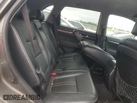 2012 Kia Sorento EX z VIN 5XYKU3A69CG279061, wystawiony jako Copart lot #60088605 z przebiegiem 272 332 mil mil oraz Czysty tytuł • Clean title. Historia ofert i sprzedaży dostępna na DreamBid. Obrazek 11.