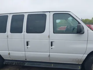 2014 Ford Econoline Passenger XL with VIN 1FBNE3BL4EDA97935, listed as a IAAI auction lot 42187031 with 228,696 mi miles. Bid and sale history available at carsss.com. Image 13.