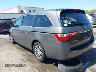 2012 Honda Odyssey EX-L with VIN 5FNRL5H68CB006686, listed as a IAAI auction lot 42039035 with 338,331 mi miles and . Bid and sale history available at carsss.com. Image 3.