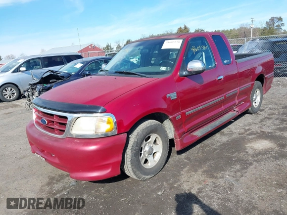 2000 Ford F-150 XL with VIN 2FTRX17W2YCA79002, listed as a IAAI auction lot 41605570 with 322,154 mi miles. Bid and sale history available at carsss.com. Image 2.
