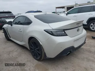 2023 Toyota 86 Premium with VIN JF1ZNBF12P8765779, listed as a IAAI auction lot 41734760 with 8,887 mi miles and . Bid and sale history available at DreamBid. Image 3.