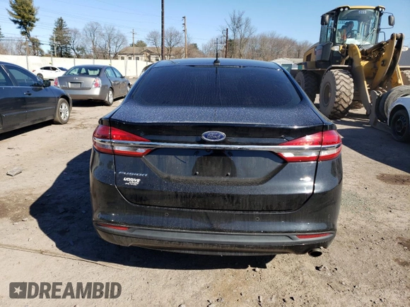 2018 Ford Fusion SE с VIN 3FA6P0H7XJR253664, выставлен на аукционе Copart как лот 41109513 с пробегом 122 769 миль миль и Списание • Salvage title. История ставок и продаж доступна на DreamBid. Изображение 6.