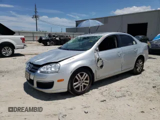 2007 Volkswagen Jetta Wolfsburg Edition with VIN 3VWEG71K57M146456, listed as a Copart auction lot 61636455 with 113,554 mi miles and Salvage title. Bid and sale history available at DreamBid. Image 1.