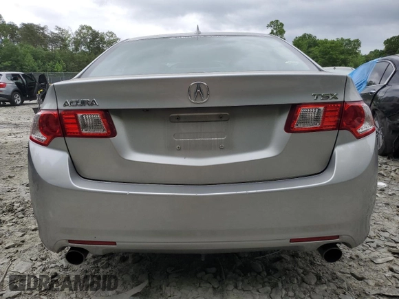 2010 Acura TSX z VIN JH4CU2F62AC032889, wystawiony jako Copart lot #55391025 z przebiegiem 200 521 mil mil oraz Szkoda całkowita • Salvage title. Historia ofert i sprzedaży dostępna na DreamBid. Obrazek 6.