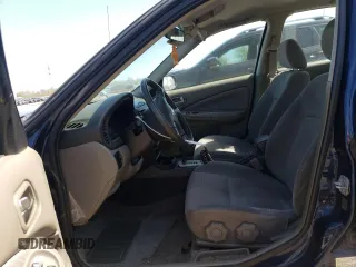 2005 Nissan Sentra 1.8 with VIN 3N1CB51DX5L456347, listed as a Copart auction lot 54887195 with 136,679 mi miles and Salvage Title. Bid and sale history available at DreamBid. Image 7.