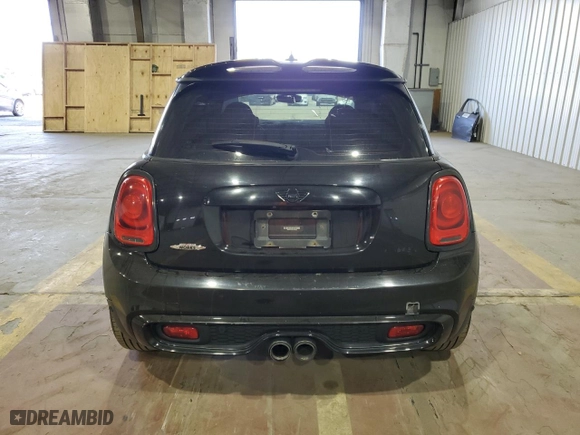 2016 MINI Cooper Hardtop S with VIN WMWXP7C58G3B49825, listed as a Copart auction lot 70988364 with 106,474 mi miles and Salvage Title. Bid and sale history available at carsss.com. Image 6.