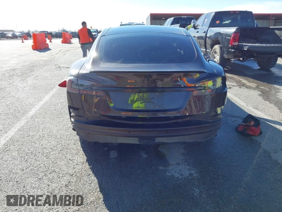 2014 Tesla Model S 60 with VIN 5YJSA1H17EFP33275, listed as a IAAI auction lot 41778167 with 202,749 mi miles and . Bid and sale history available at DreamBid. Image 16.