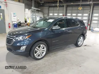 2019 Chevrolet Equinox Premier z VIN 3GNAXNEVXKS500672, wystawiony jako IAAI lot #42042922 z przebiegiem 77 440 mil mil oraz . Historia ofert i sprzedaży dostępna na DreamBid. Obrazek 18.