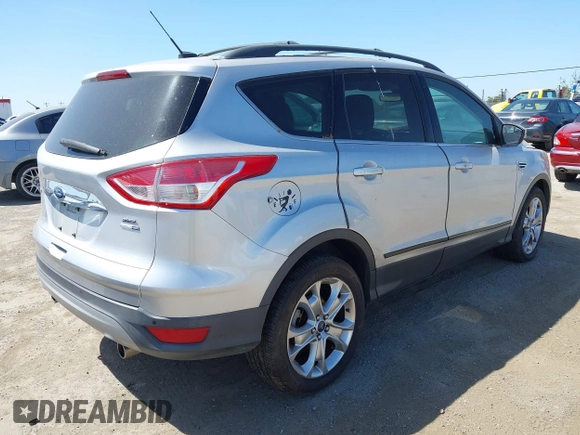 2013 Ford Escape SEL with VIN 1FMCU9HXXDUC17184, listed as a IAAI auction lot 42088020 with 63,151 mi miles. Bid and sale history available at carsss.com. Image 4.