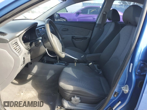 2010 Kia Rio LX with VIN KNADH4A33A6632951, listed as a Copart auction lot 72629144 with 168,289 mi miles and Salvage Title. Bid and sale history available at DreamBid. Image 7.