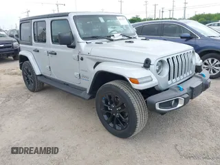 2023 Jeep Wrangler Sahara with VIN 1C4JJXP62PW627455, listed as a IAAI auction lot 42115137 with 62,143 mi miles and . Bid and sale history available at carsss.com. Image 1.