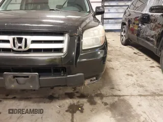 2007 Honda Pilot EX-L with VIN 5FNYF18677B017230, listed as a IAAI auction lot 41727853 with 257,527 mi miles and . Bid and sale history available at DreamBid. Image 6.