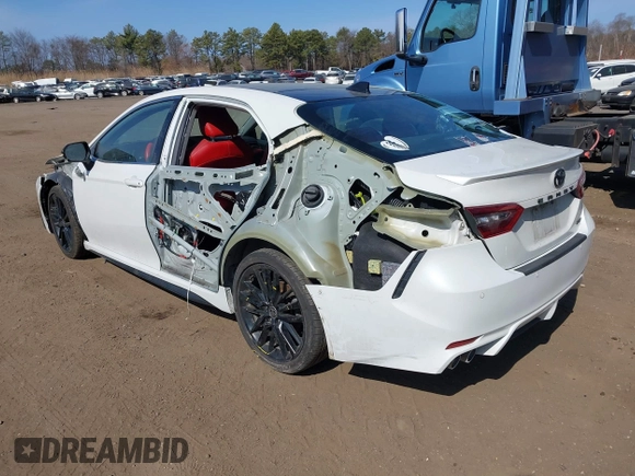 2022 Toyota Camry TRD with VIN 4T1KZ1AK9NU071181, listed as a IAAI auction lot 41758219 with 103,200 mi miles and . Bid and sale history available at DreamBid. Image 3.