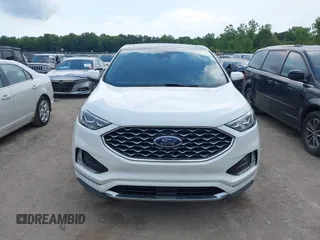 2021 Ford Edge Titanium with VIN 2FMPK4K96MBA18546, listed as a IAAI auction lot 42584326 with 65,214 mi miles and . Bid and sale history available at DreamBid. Image 12.