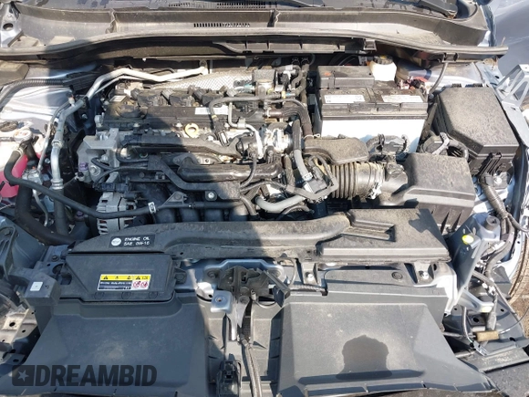 2022 Toyota Corolla Cross XLE with VIN 7MUEAABG1NV038625, listed as a IAAI auction lot 42434536 with 47,983 mi miles and . Bid and sale history available at DreamBid. Image 10.