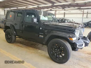 2024 Jeep Wrangler Sahara with VIN 1C4RJXP67RW292134, listed as a Copart auction lot 60993555 with 10,038 mi miles and Salvage title. Bid and sale history available at DreamBid. Image 4.